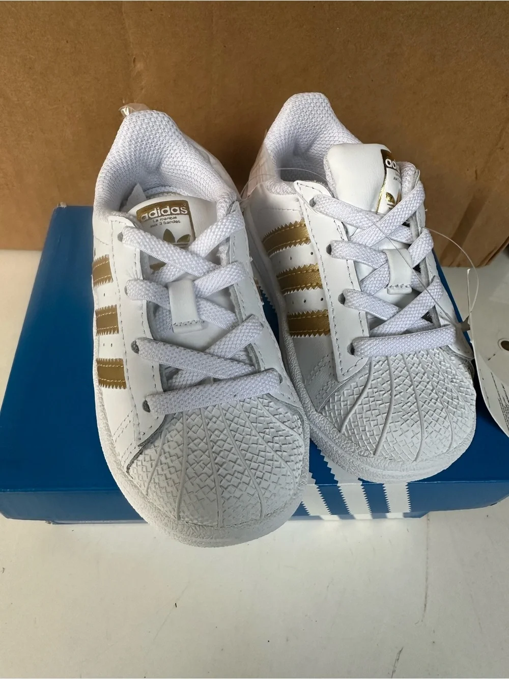 adidas Kids White Sneakers with Gold Stripes
